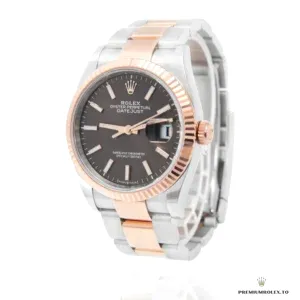 Side profile showing Everose gold-plated fluted bezel grooves on 126231