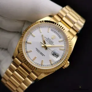 Crown close-up with Rolex coronet on yellow gold-plated case