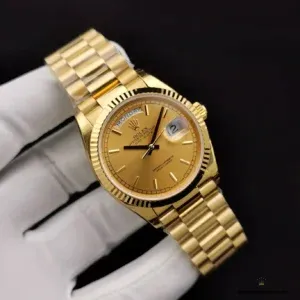 President bracelet detail with matching yellow gold three-link design
