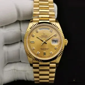 Day-Date 128238 side profile with yellow gold-plated case and bezel
