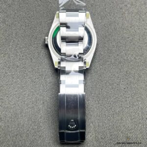 Wrist shot showing colourful celebration dial pattern in natural light