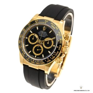 Side profile of yellow gold-plated case with ceramic bezel and screw-down pushers