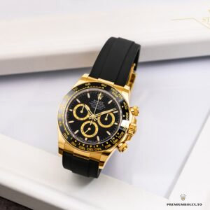 Wrist shot of gold Daytona on Oysterflex in natural lighting