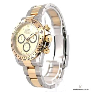 Dial close-up revealing champagne golden finish and subdial detail