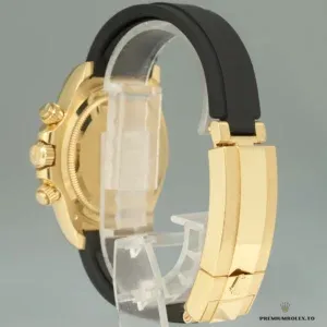 Golden champagne dial close-up with applied gold hour markers