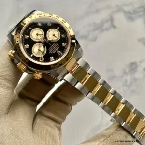 Close-up of 8 diamond hour markers on the black Daytona 126503 dial