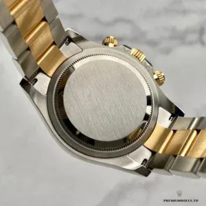 Gold subdial detail at 6 o'clock on the black diamond Daytona dial