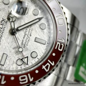 Applied hour markers raised above meteorite dial surface