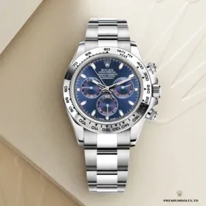 Close-up of navy blue dial with silver subdial registers