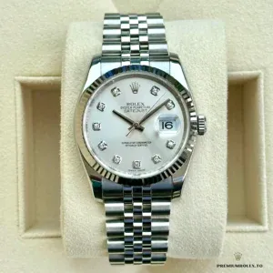 Close-up of mother of pearl dial surface with diamond hour markers on 126233