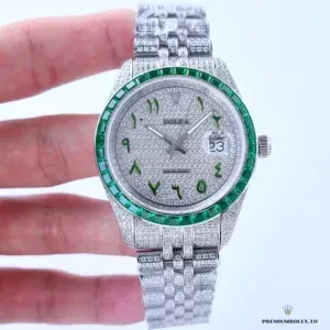 Side angle of 126300 showing green bezel stones against Oystersteel case