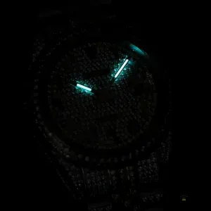 Dial surface macro with diamond refraction under studio light