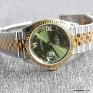 Two-tone Datejust with green Roman numeral dial, fluted bezel and Jubilee bracelet on grey fabric