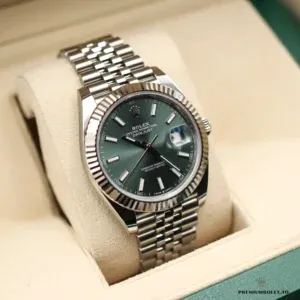 Close-up of mint green dial with applied hour markers