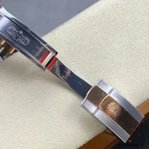Clasp mechanism on Oyster bracelet showing fold-over design
