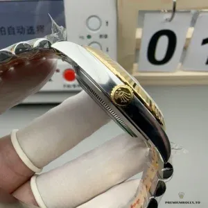 Side profile showing fluted bezel and 36mm case proportions