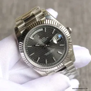 Close-up of dark rhodium dial texture and applied hour indices