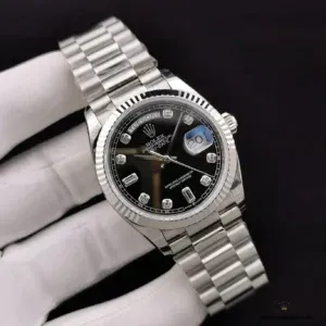 Day-Date 128238 black dial side profile showing fluted bezel and case edge
