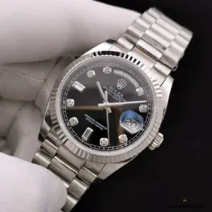 Rolex Day-Date 128238 black dial close-up showing diamond hour markers