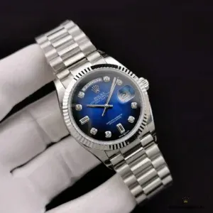 Day-Date 128238 blue ombre side profile showing gradient depth and fluted bezel