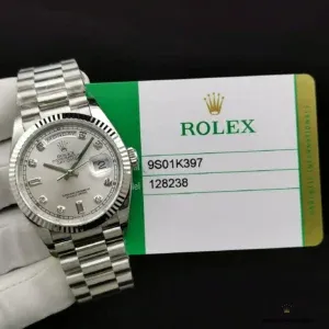 Day-Date 128238 mother of pearl angled view with fluted bezel reflections