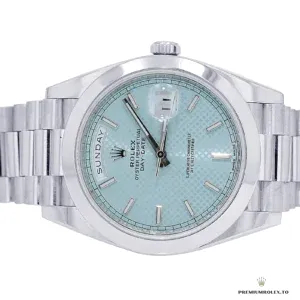 Day-Date 228238 side profile showing white gold-plated case and smooth bezel
