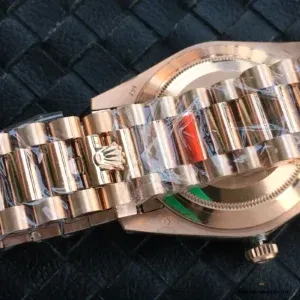 Wrist shot of Day-Date 228238 on rose gold-plated President bracelet