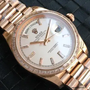 Close-up of rose gold sunburst dial with diamond indices