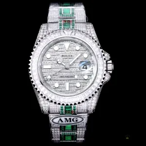 Side angle showing green diamond Oyster links against iced steel case