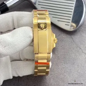 GMT-Master II yellow gold side profile showing crown guards and Triplock crown