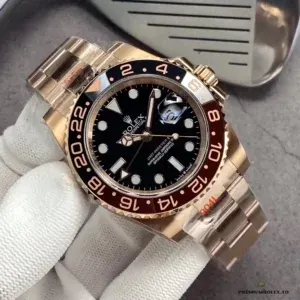 Replica 126710BLRO rose gold dial close-up with applied markers and date window