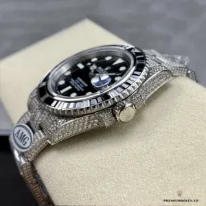 Side profile showing 40mm iced case with green Cerachrom bezel accent