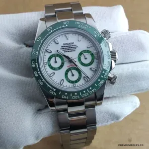 Side profile of Daytona 116500 with green bezel and pushers