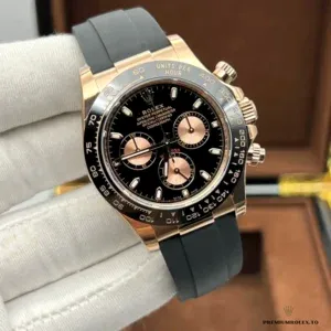 Close-up of black chronograph dial with rose gold applied indices