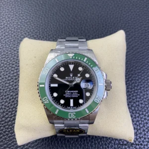 Submariner 126610LV green bezel close-up showing platinum-coated numerals