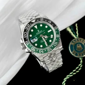 Close-up of absinthe green lacquered dial with applied white gold markers