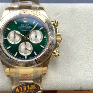 Close-up of green dial with champagne gold chronograph subdials