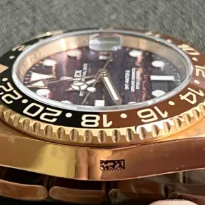 Close-up of brown-black Cerachrom bezel on the 126715CHNR