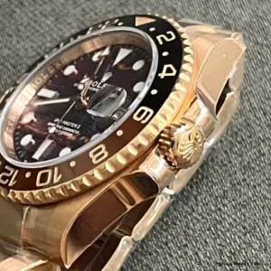 GMT-Master II 126715CHNR side angle showing Everose gold-plated case