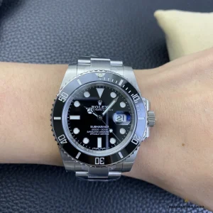 Submariner 116610LN side profile showing Oystersteel case and ceramic bezel
