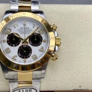Daytona 116523 two-tone at angle highlighting gold-plated bezel against white dial