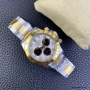 Rolex Daytona 116523 bracelet stretch showing gold and steel links