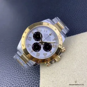 Close-up of white dial with gold-tone subdials on the Daytona 116523