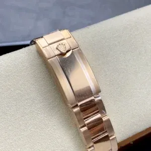 Close-up of rose gold sunburst dial and matching subdials on the 116505