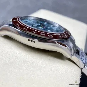 Daytona 116506 at angle showing brown bezel against ice blue dial contrast