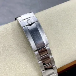 Close-up of chestnut brown Cerachrom bezel with moulded tachymeter numerals