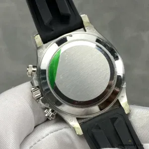 Daytona 116519LN side profile showing engraved tachymeter bezel in white gold plating