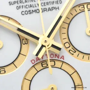 Yellow gold tachymeter bezel scale detail on the Daytona 126503