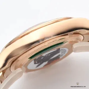 Rolex Daytona 126505 Everose gold-plated bracelet drape on display stand