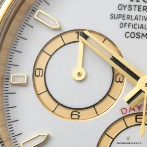 Rolex Daytona 126508 bracelet drape showing three-piece gold-plated links
